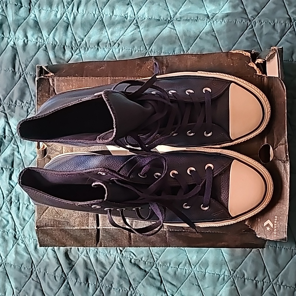 Blue leather Converse